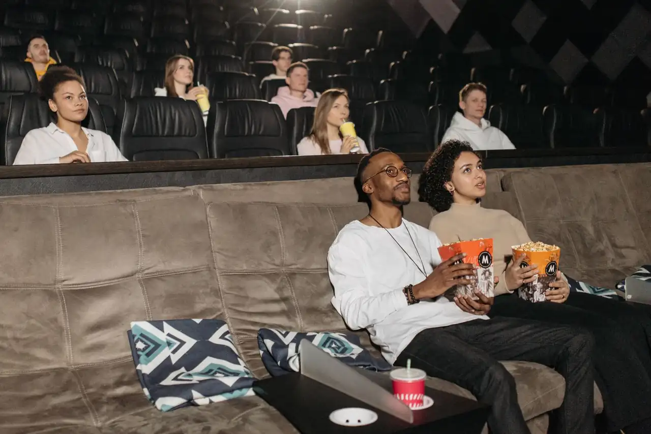 Family enjoying a movie